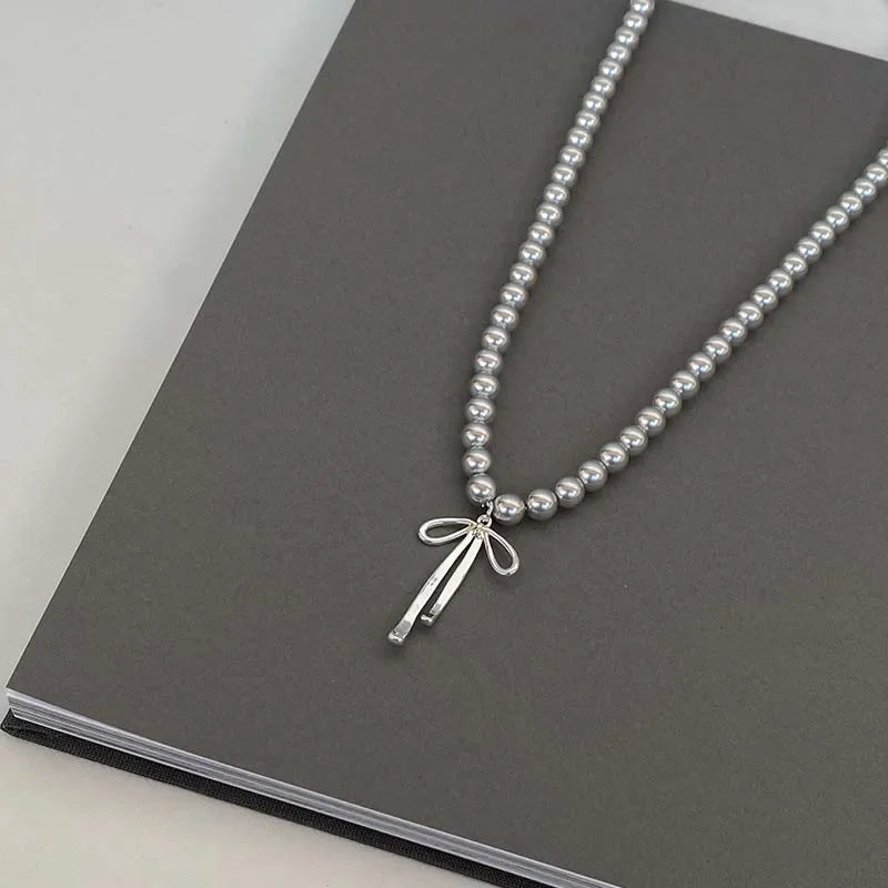 Metal Bowknot Pendant Imitation Pearl Necklace For Women Grey Color
