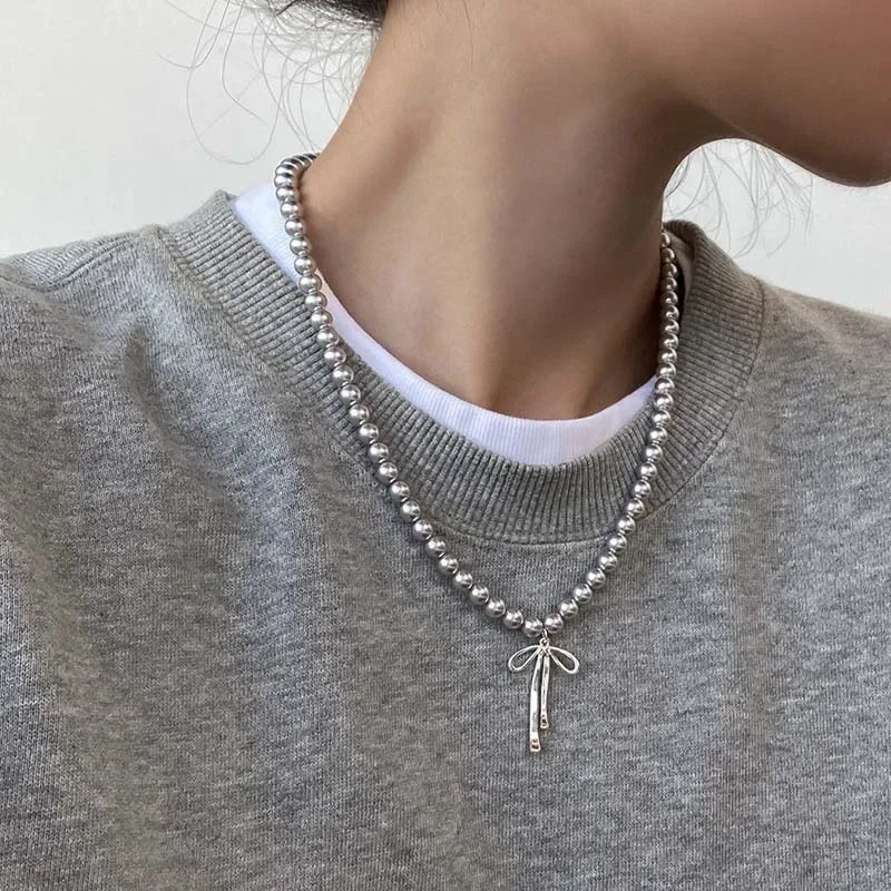 Metal Bowknot Pendant Imitation Pearl Necklace For Women Grey Color