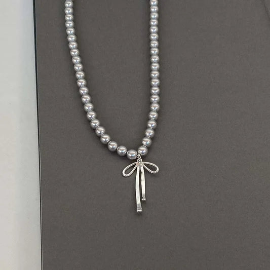 Metal Bowknot Pendant Imitation Pearl Necklace For Women Grey Color